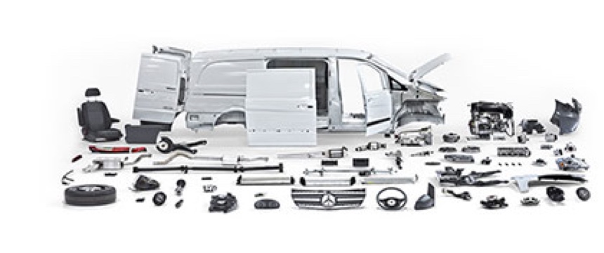 A van dismantled and arranged neatly into individual parts.